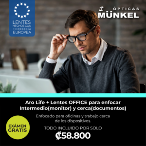 Hombre trabajando en oficina usando lentes Office Aro Life para monitor y lectura cercana.